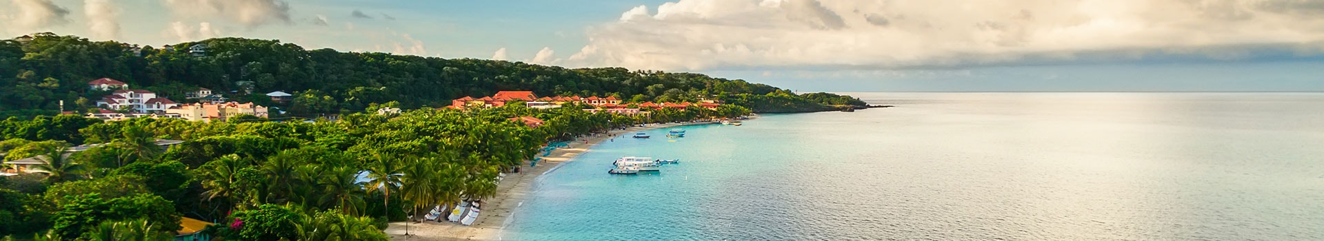 Ofertas Voo + Hotel a **Coxen Hole**