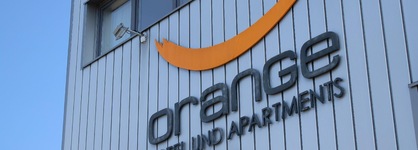 Orange Hotel Und Apartments