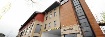 Carrick Plaza Suites & Apartments