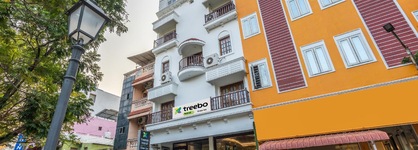 Treebo Grace Inn, 3 Min Walk From Promenade Beach