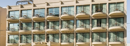 Olivia Palm Hotel